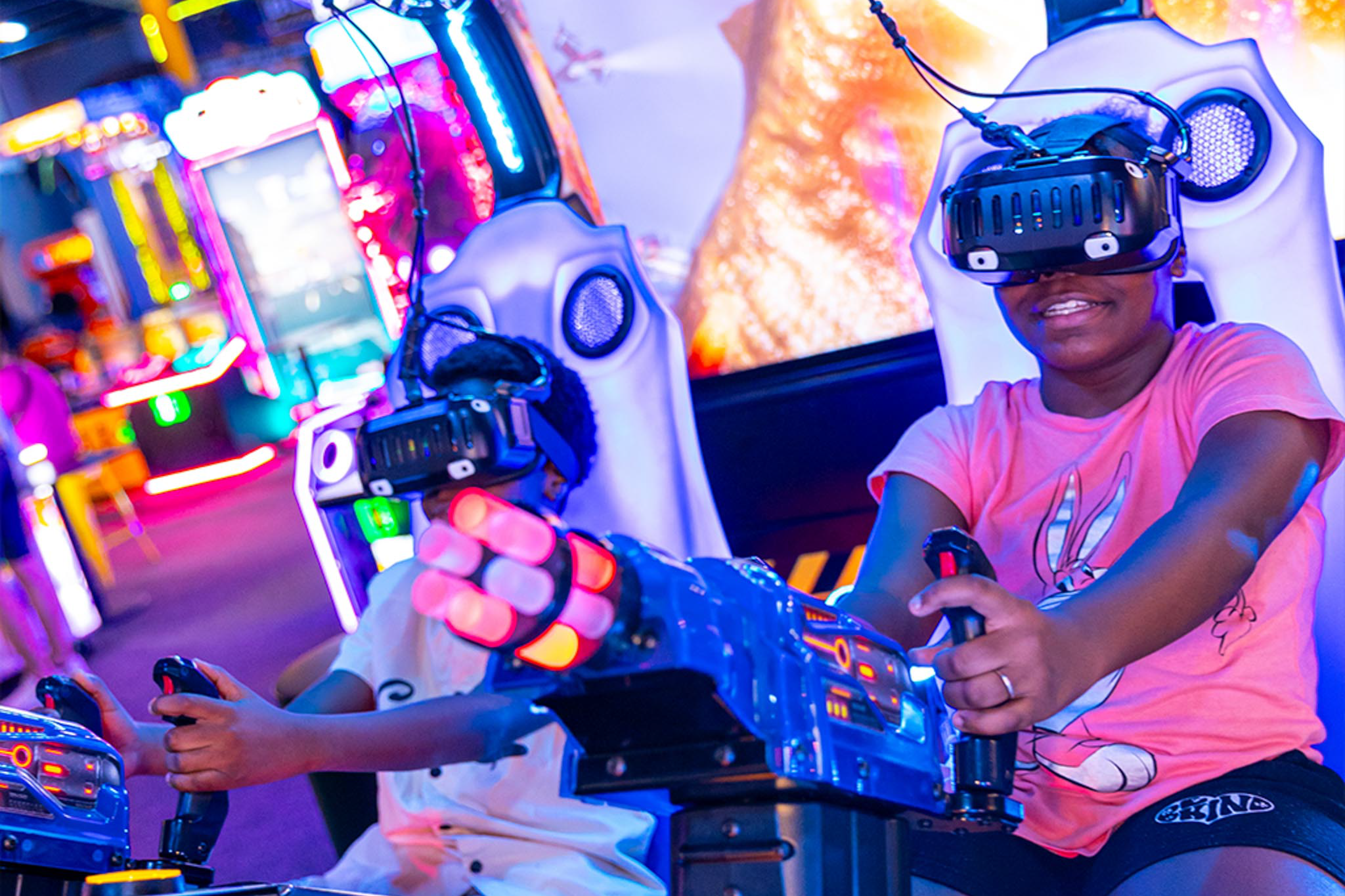 three young girls playing VR games